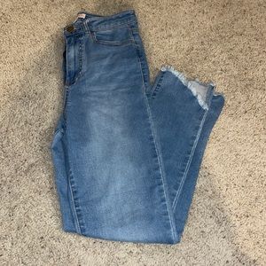 Blue jeans with cute cut on the bottom